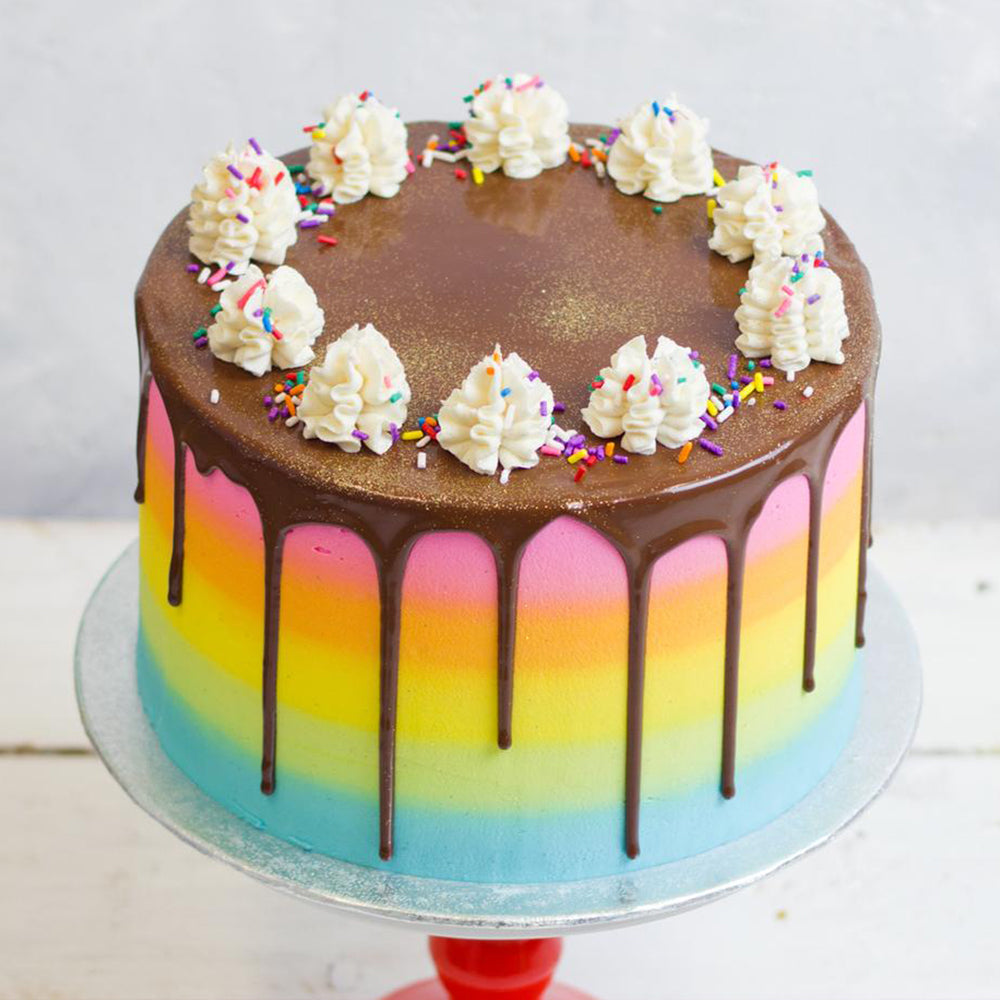 Chocolate drip rainbow cake