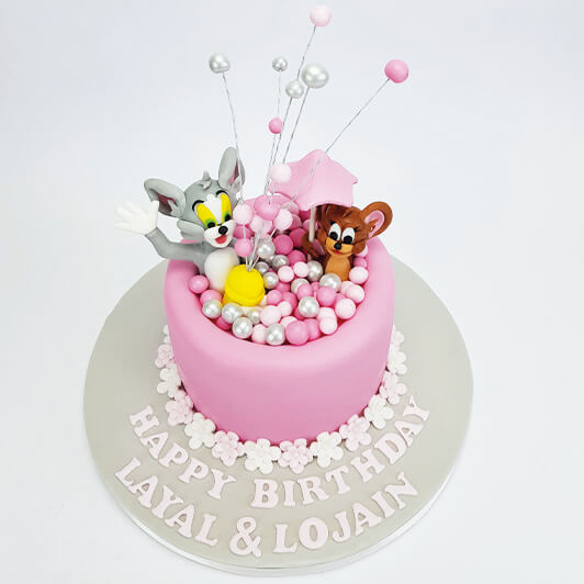 Tom &amp; Jerry in Pink &amp; Silver Bouncy Castle Cake